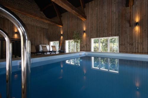 a large swimming pool in a house with at Logis Nature & Mer in Saint-Josse