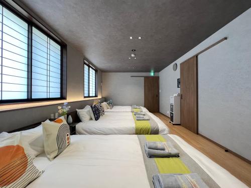 En eller flere senge i et værelse på nestay villa tokyo nippori
