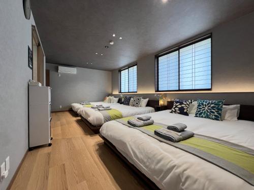 En eller flere senge i et værelse på nestay villa tokyo nippori