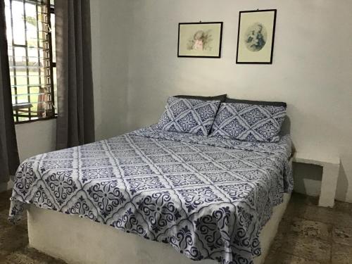 Cama o camas de una habitación en Roomsmagicoco