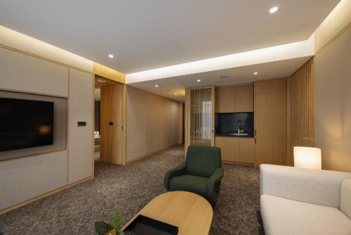 Wellpark Hotel Gochangにあるテレビまたはエンターテインメントセンター