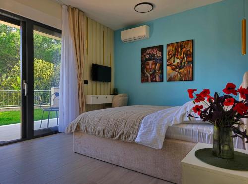 Ένα ή περισσότερα κρεβάτια σε δωμάτιο στο Villa Golden Grain