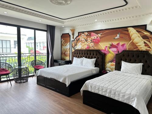 Ένα ή περισσότερα κρεβάτια σε δωμάτιο στο Golden Rose Premium Hotel Hanoi