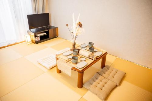 Televisyen dan/atau pusat hiburan di WaNagoya1005 Sta Area3min Subway4pplDryerLong Stay