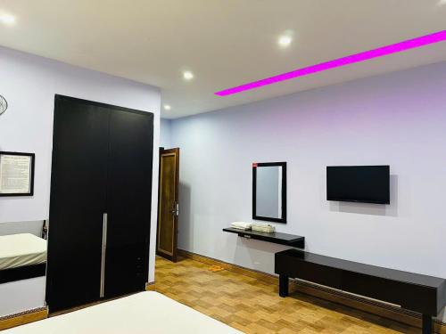 TV a/nebo společenská místnost v ubytování Việt Thương Motel