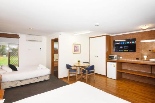 Katil atau katil-katil dalam bilik di Greenacres Motel