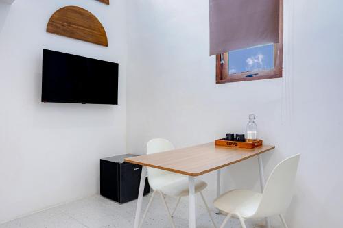 Cove Kisah Residenceにあるテレビまたはエンターテインメントセンター