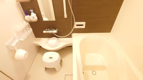 a small bathroom with a toilet and a sink at 22minutes by car to Nagoya Station 2parking 
