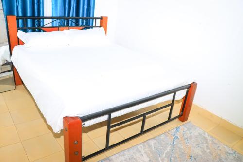 Postel nebo postele na pokoji v ubytování Comfort 1Br home in Narok