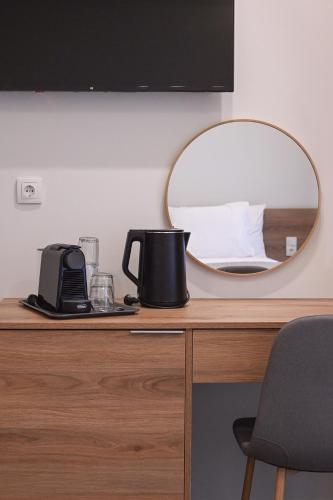 Tetera y cafetera en Aria Blu