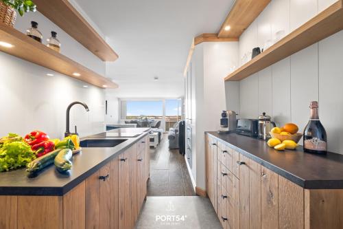 Kuchyň nebo kuchyňský kout v ubytování Ferienwohnung Möwennest Westerland Sylt