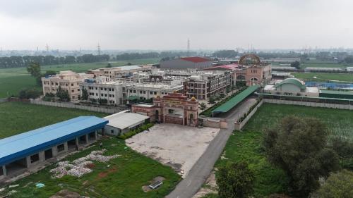 an aerial view of a city with many buildings at RIshikulam Wellness Centre in Samālkha