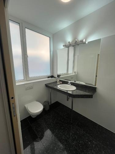Un baño de Vienna Cube Apartments Contactless Check IN