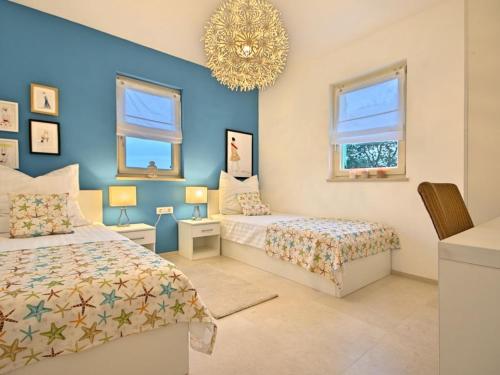 Postel nebo postele na pokoji v ubytování Barbara with Pool Comfortable holiday residence