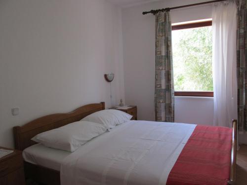 Postel nebo postele na pokoji v ubytování Tower Suites Korcula