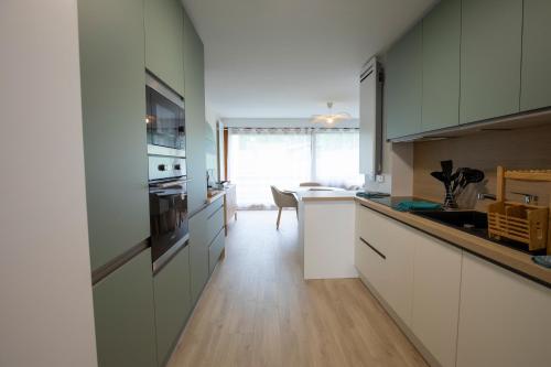 Kuchyň nebo kuchyňský kout v ubytování Appartement La Dole et Sens Au pied des pistes