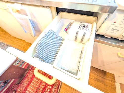 an open drawer with a tie in it at 17minutes by car to Nagoya-Sta 1parking in Chiharachō