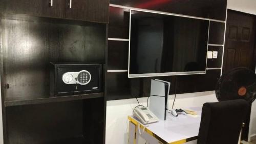 TV a/nebo společenská místnost v ubytování Dsign Apartment And Lounge