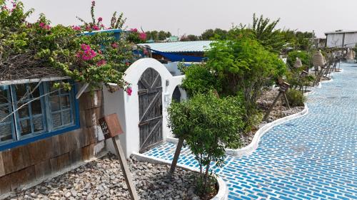 Κήπος έξω από το Banan Beach