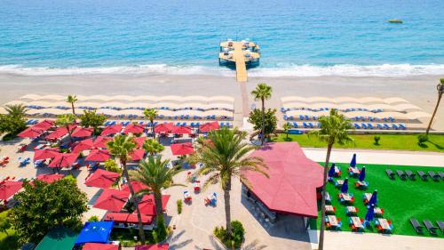 an overhead view of a resort with a beach at Senza Sunset Beach Hotel in Alanya