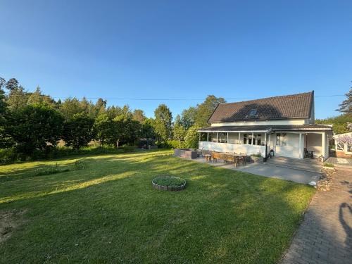 an aerial view of a house with a large yard at Charming Cottage near Beach & Nature in Sarpsborg
