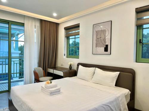 Кровать или кровати в номере Elyday Villa - Bai Khem Beach, Phu Quoc