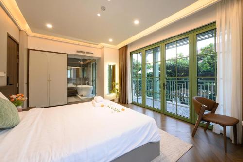 Кровать или кровати в номере Elyday Villa - Bai Khem Beach, Phu Quoc