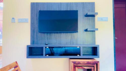 TV a/nebo společenská místnost v ubytování SUNSET SANDS Resort