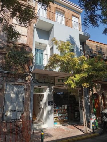 a store in front of a building at Tourni Cozy Chios in Chios