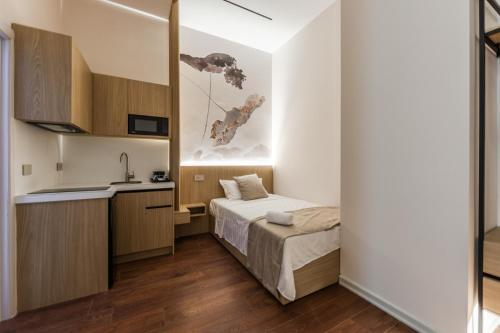 Kingdom Family Apartment's Durres Centerにあるベッド