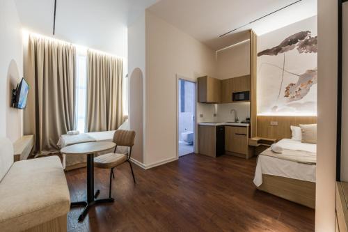 Kingdom Family Apartment's Durres Centerにあるベッド