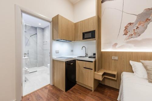 Kingdom Family Apartment's Durres Centerにあるキッチンまたは簡易キッチン