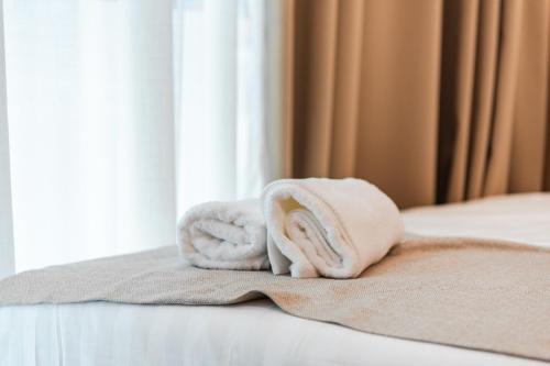 Kingdom Family Apartment's Durres Centerにあるベッド