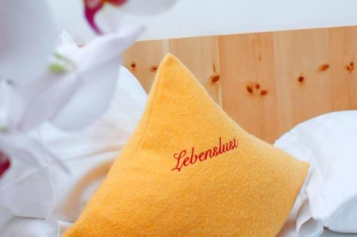 a burrito with the word filipino written on it at Hotel Erlebniswelt Stocker in Schladming