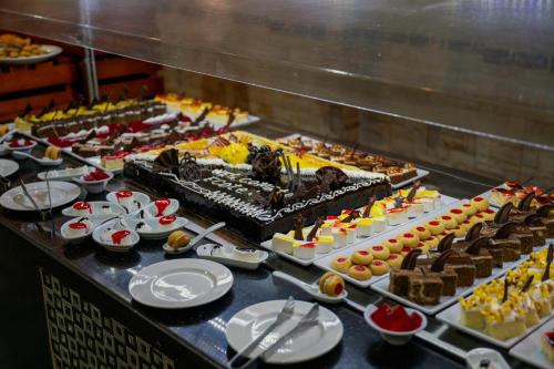 a buffet of different types of food on a table at Ecotel Dahab Bay View Resort in Dahab