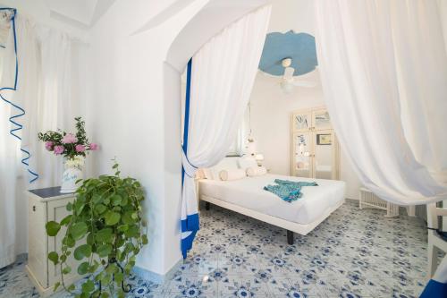 Letto o letti in una camera di San Michele Hotel Terme & Spa