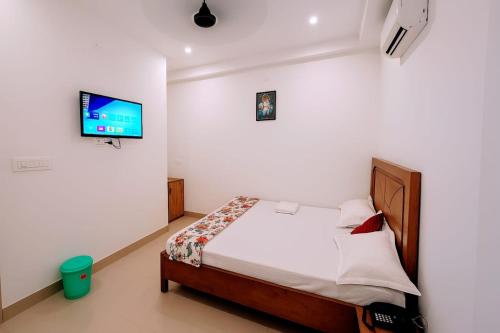 Postel nebo postele na pokoji v ubytování Hotel Babua Jee