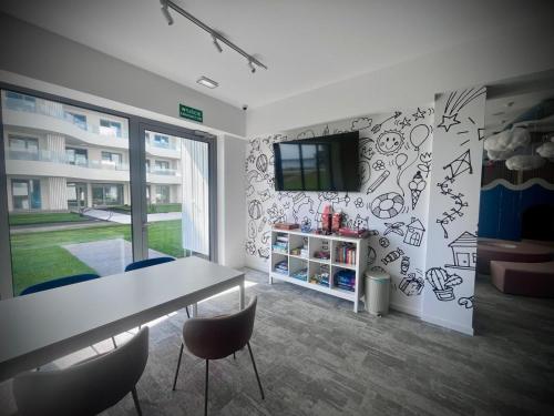 Φωτογραφία από το άλμπουμ του White Pearl Apart Gamma Budynek σε Rogowo