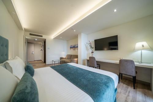 TV a/nebo společenská místnost v ubytování Hotel Concordia Barcelona