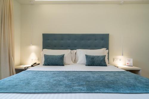 Postel nebo postele na pokoji v ubytování Hotel Concordia Barcelona
