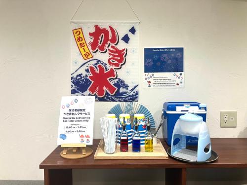 a table with a coffee maker and a box on it at ENT TERRACE Asakusa in Tokyo