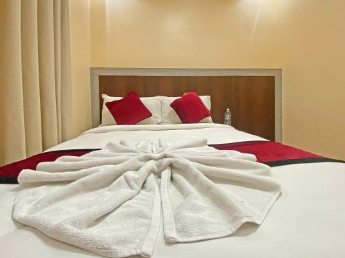 Hotel Five Season Innにあるベッド