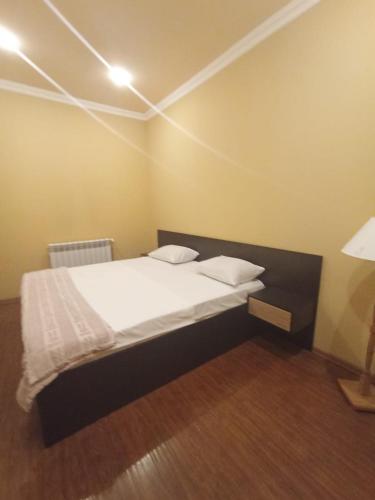 a bedroom with a bed in a room at Kalachi guest house Armenia in Yerevan