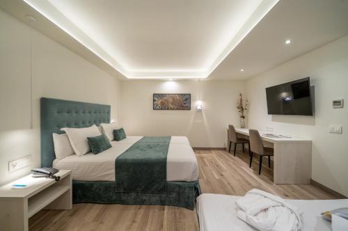 Postel nebo postele na pokoji v ubytování Hotel Concordia Barcelona
