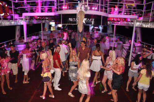 a group of people dancing at a party at A dream house with a dream view in ROYAL PARK in Alanya