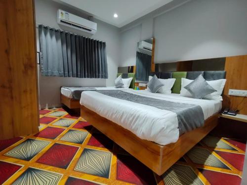 Una cama o camas en una habitación de Hotel sunway