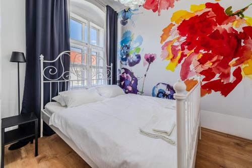 Katil atau katil-katil dalam bilik di Old Town Heritage Apartments