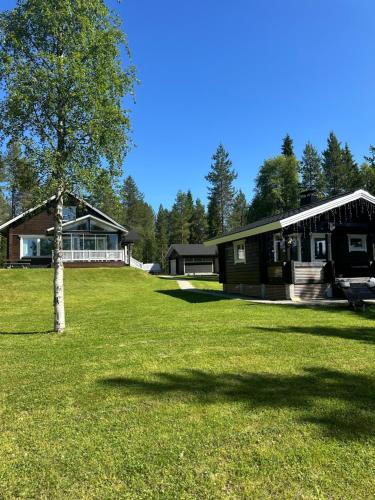 Zahrada ubytování Villa Ihanus 100 m2 ja rantasauna järven rannalla