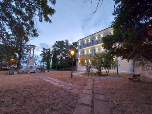 a building with a monument in front of it at Al Monumento bed & breakfast in Amantea