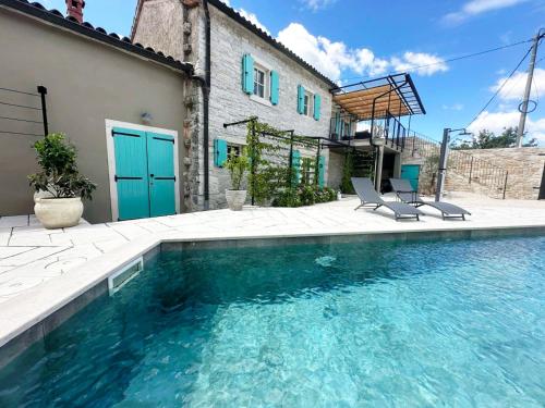 Πισίνα στο ή κοντά στο Villa Mint with Pool